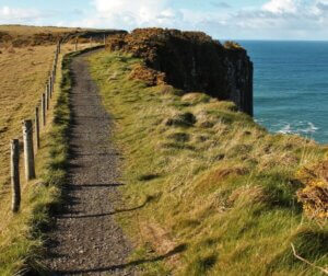 a pathway near a cliff Causeway Coast Walks